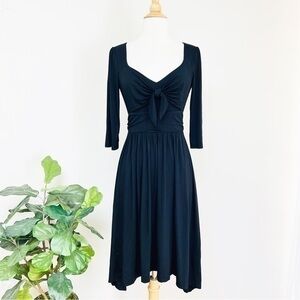 Anthropologie black bow front midi dress